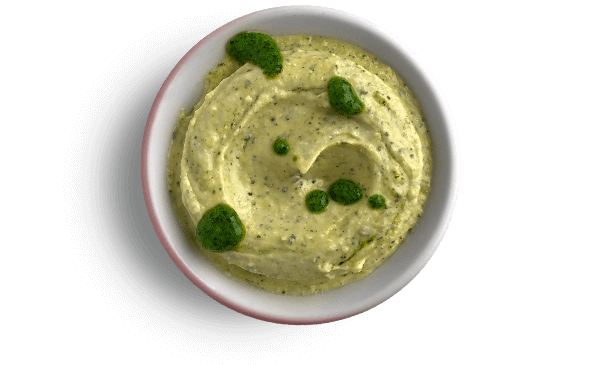 Small dip bowl of Hummus Pesto Sauce